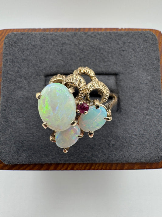 Heavy 9ct gold opal and ruby ring