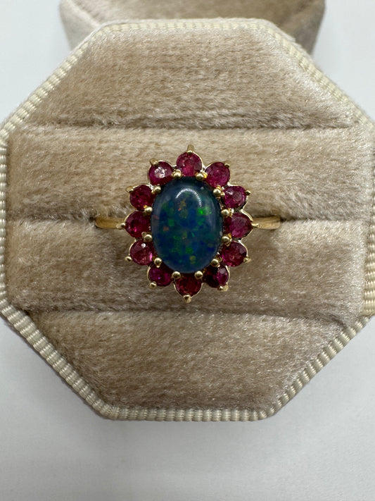 9ct gold black opal triplet and ruby cluster ring