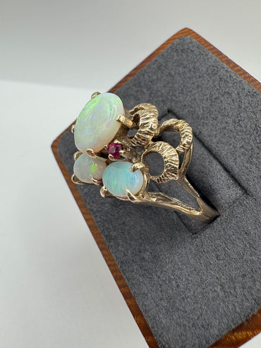 Heavy 9ct gold opal and ruby ring