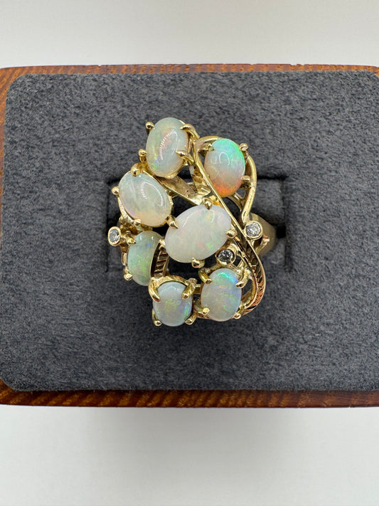 Heavy 9ct gold opal and diamond cluster ring