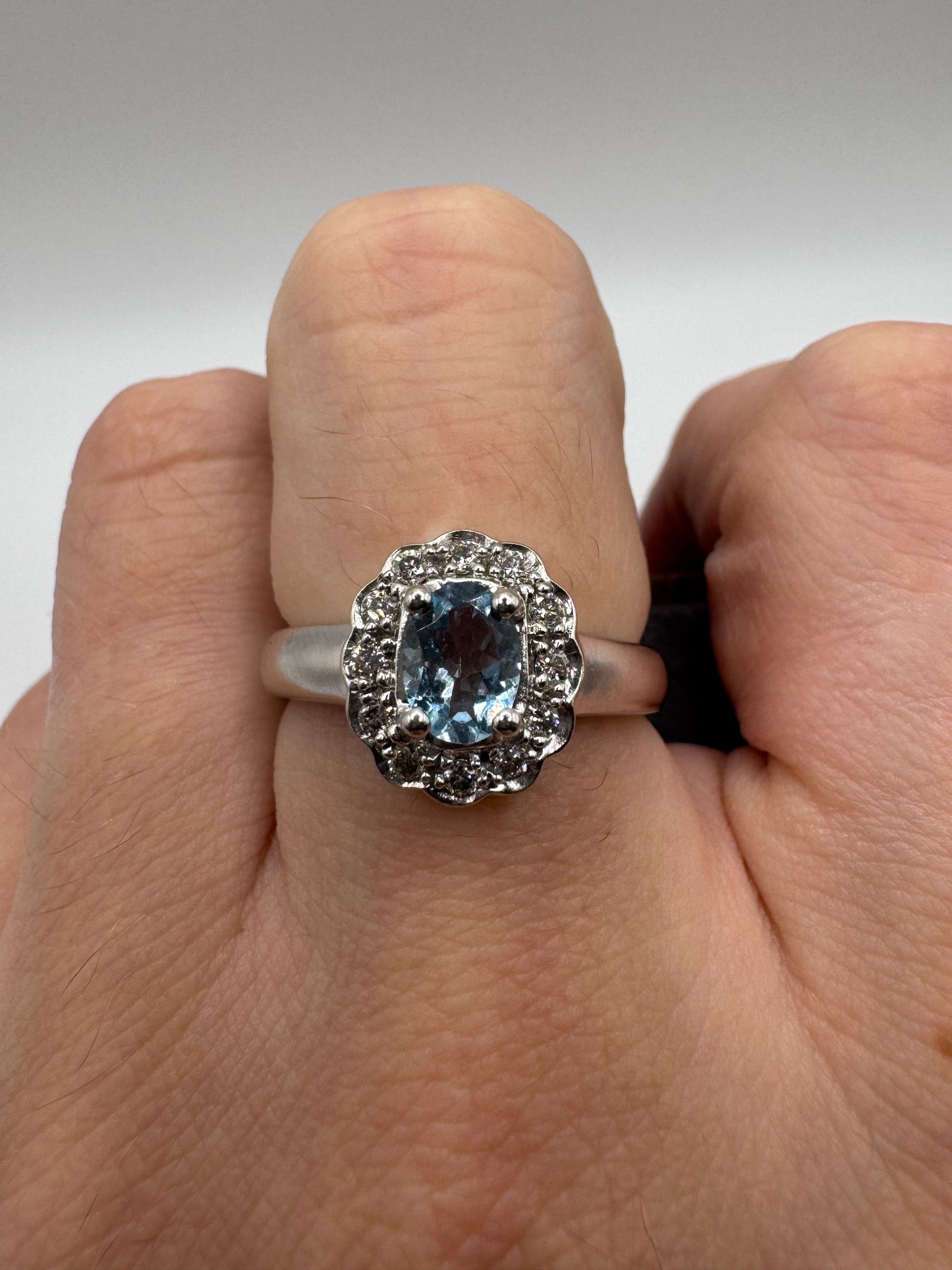 Heavy 9ct white gold topaz and diamond ring