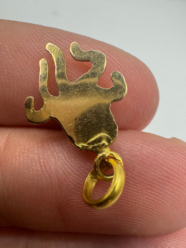18ct gold octopus pendant