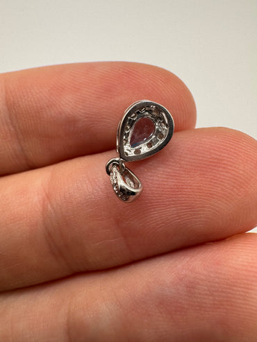 9ct white gold topaz and diamond pendant