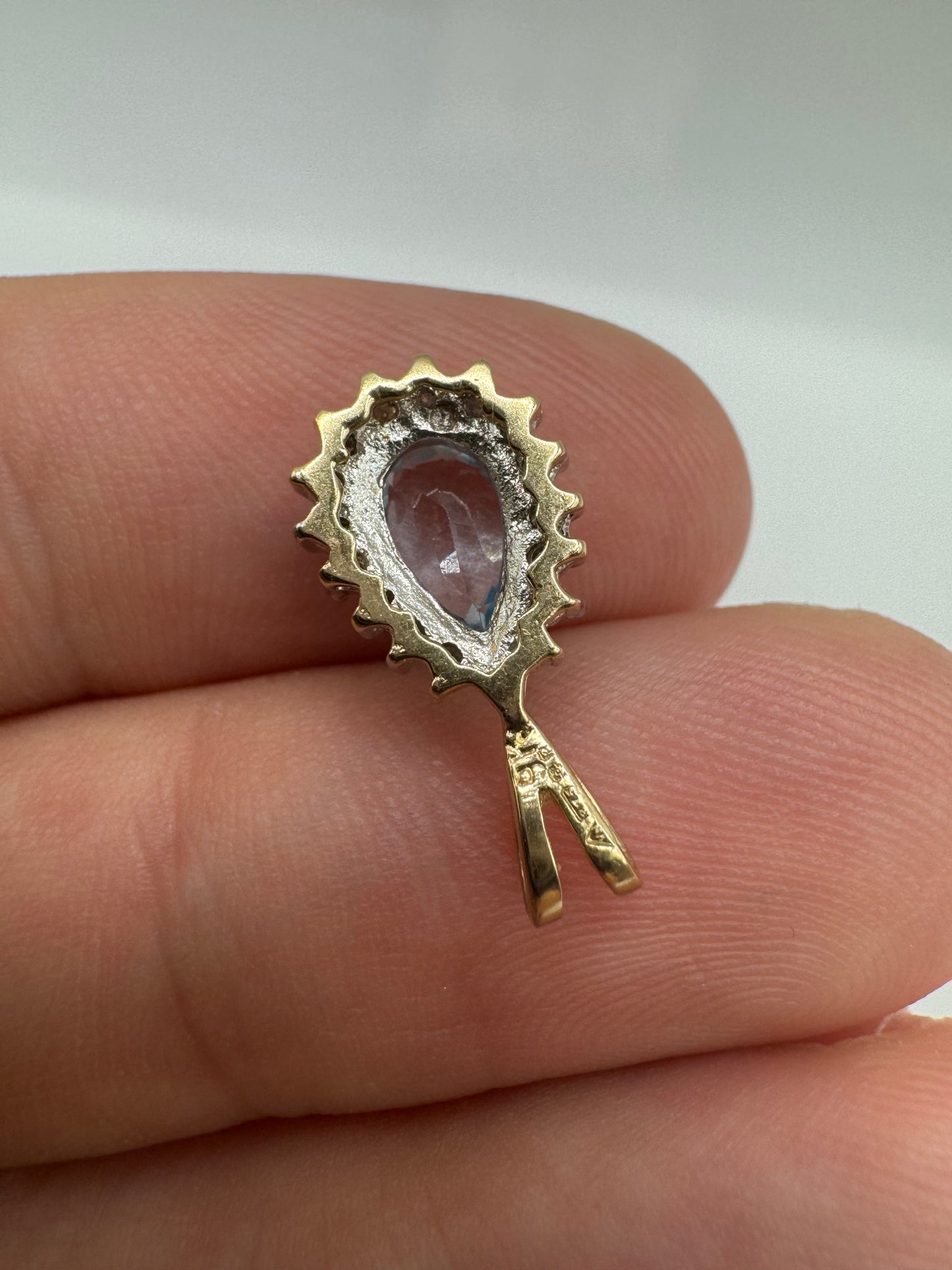 9ct gold topaz and diamond pendant