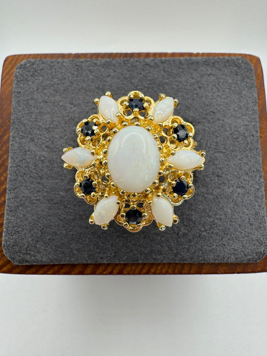 Heavy 9ct gold opal and sapphire ring