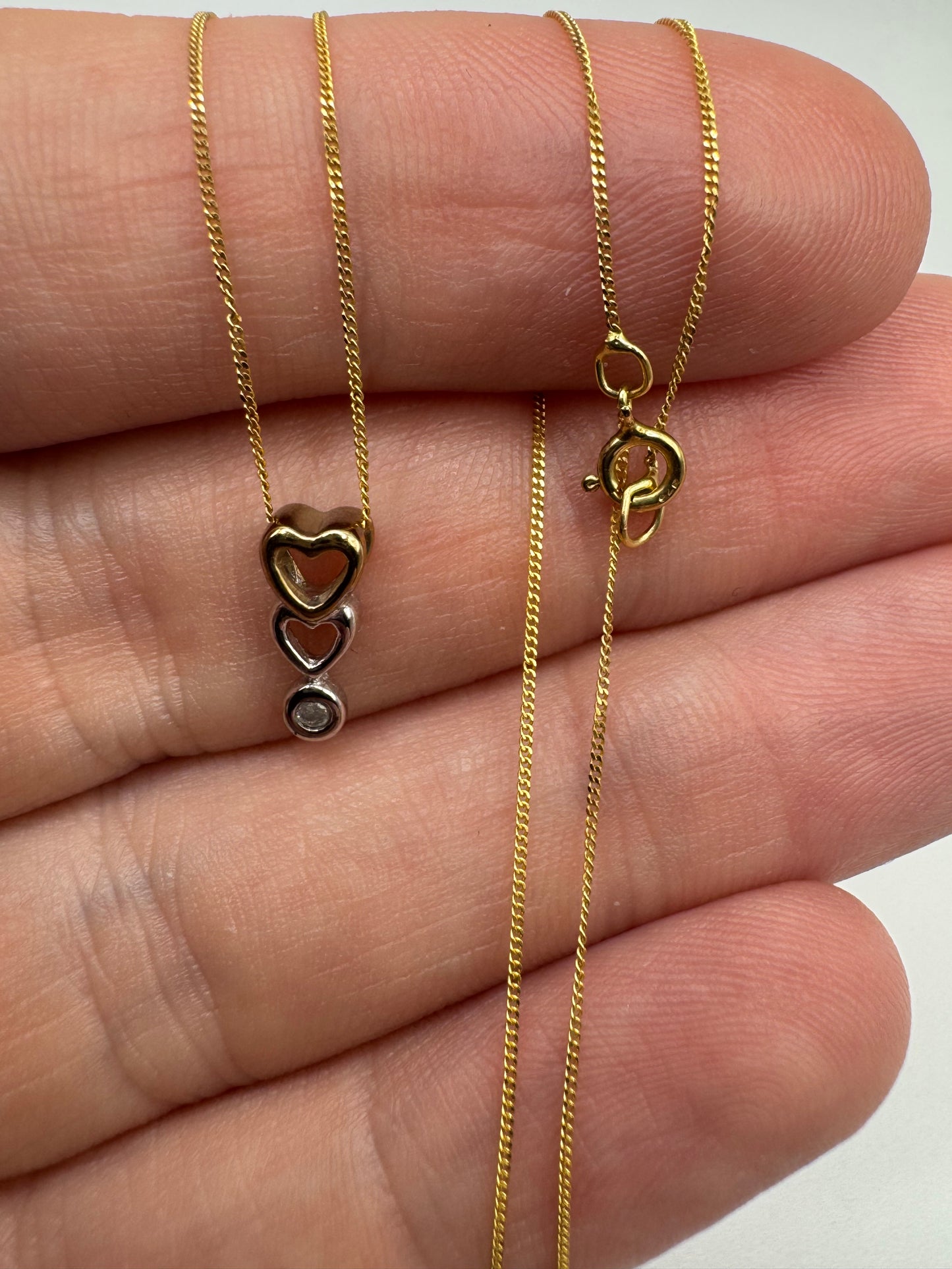 9ct gold graduating hearts diamond necklace