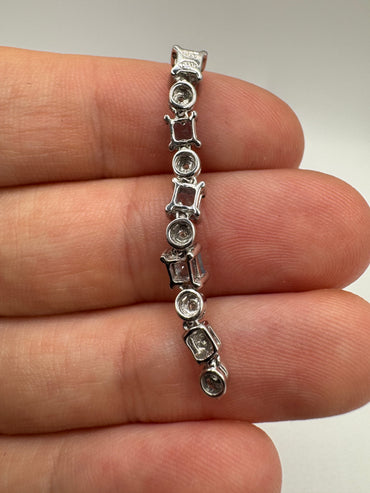 9ct white gold blue topaz and diamond pendant