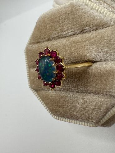 9ct gold black opal triplet and ruby cluster ring