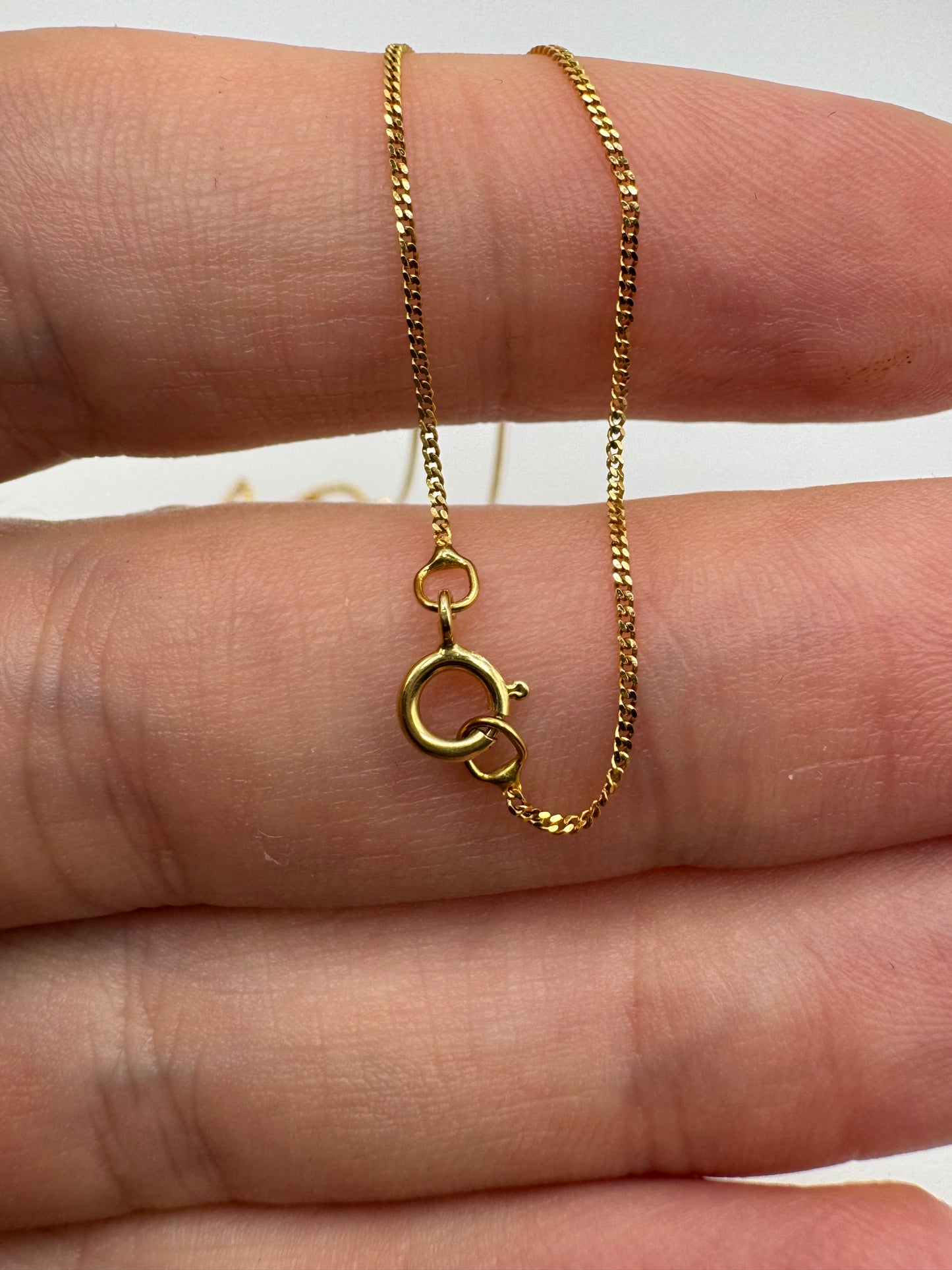 9ct gold garnet and diamond necklace (18”)