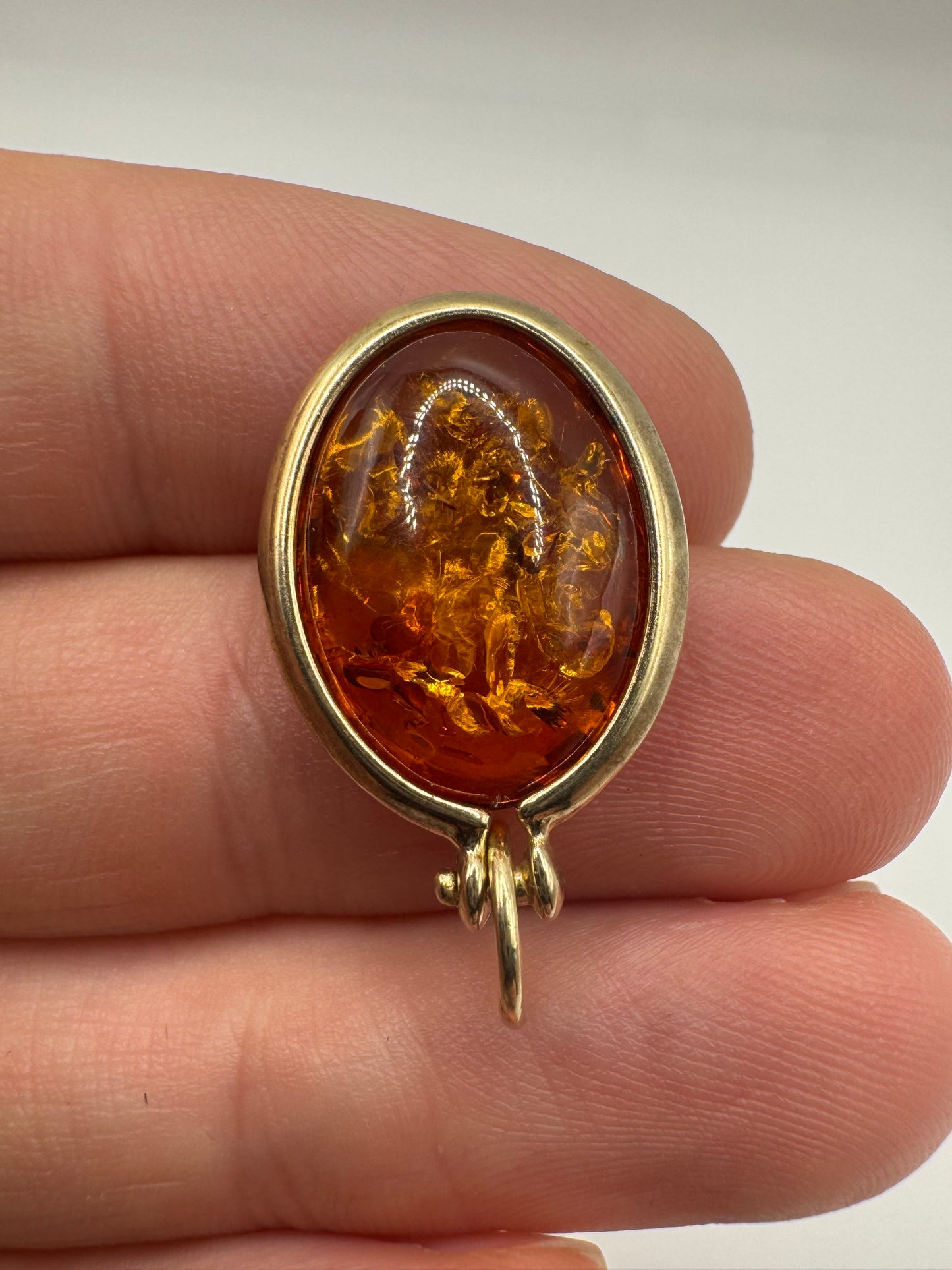Silver amber pendant