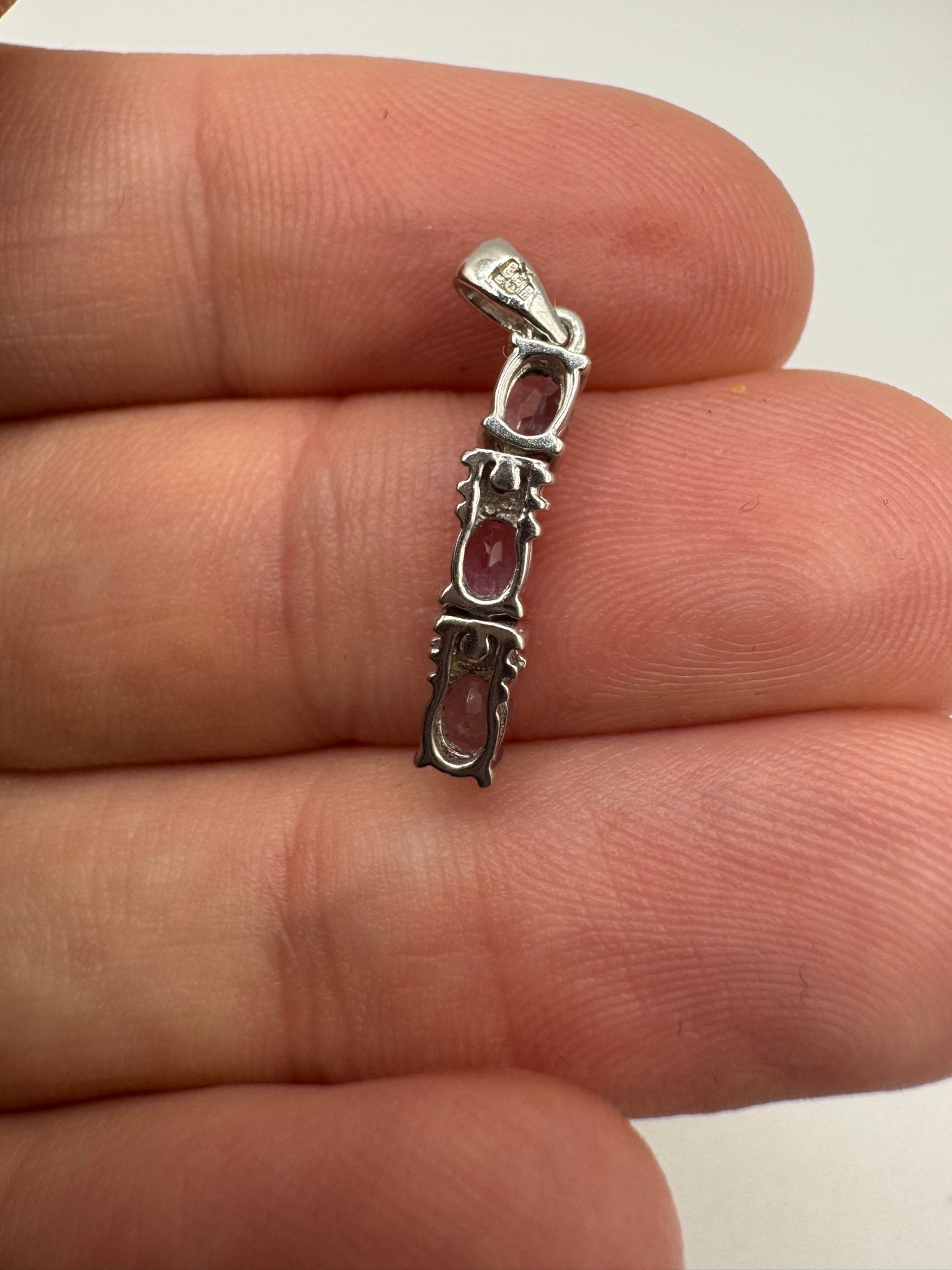 9ct white gold tanzanite and diamond pendant