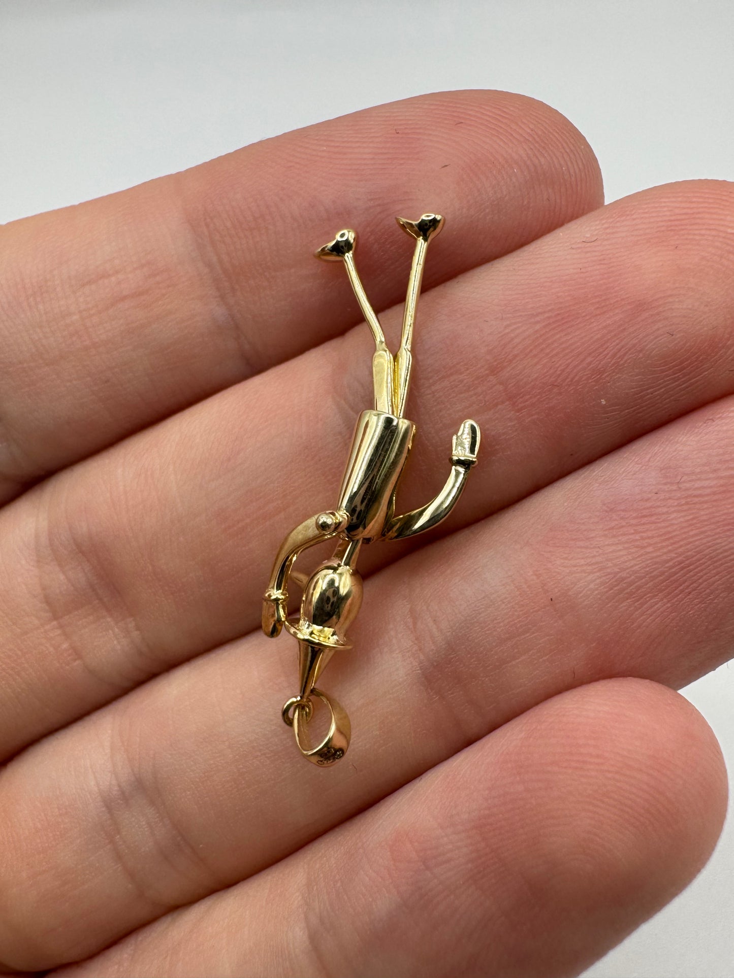 9ct gold articulated puppet pendant