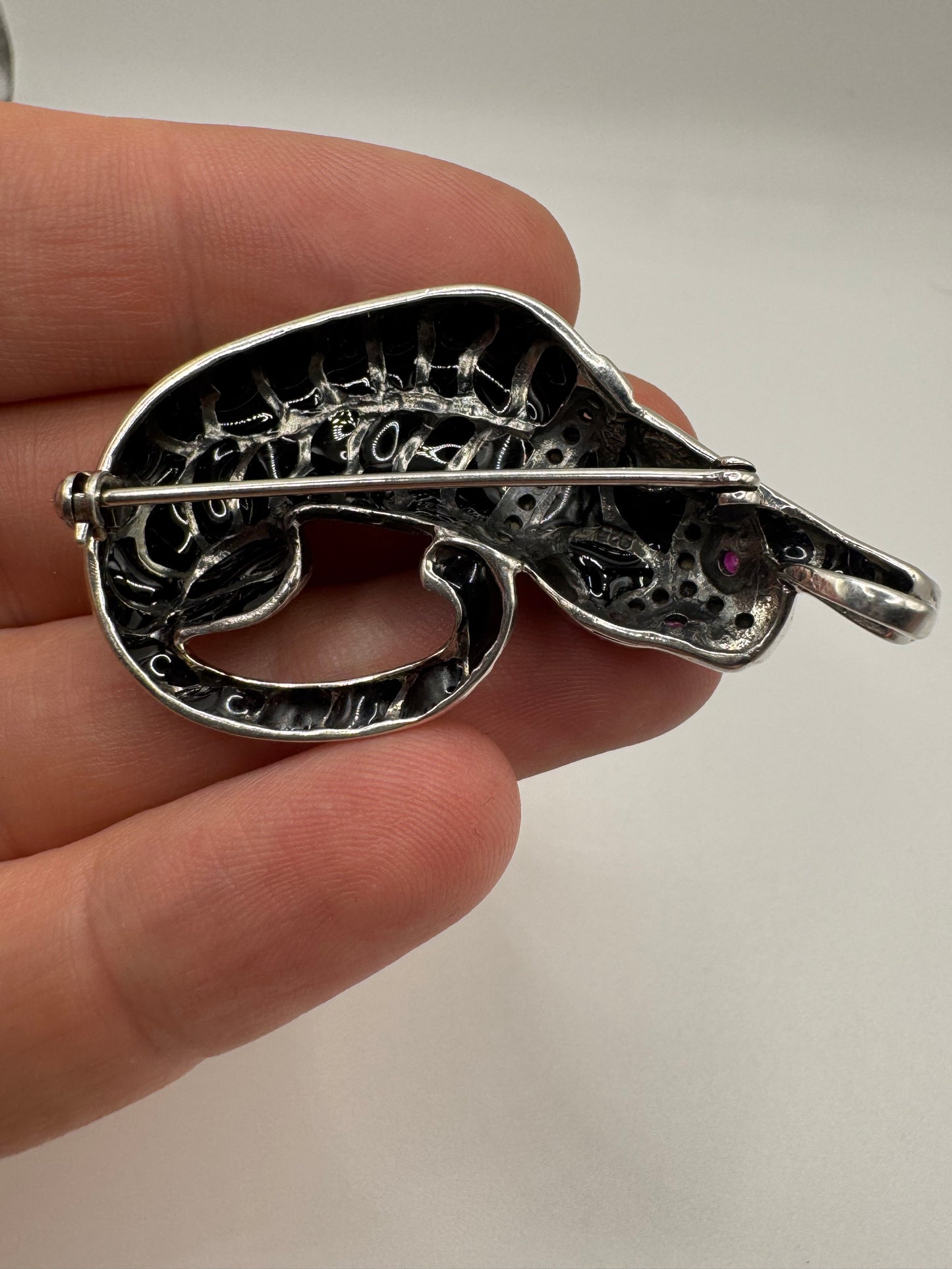 Silver ruby and marcasite enamelled brooch