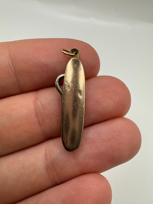 Antique 9ct rose gold button hook pendant