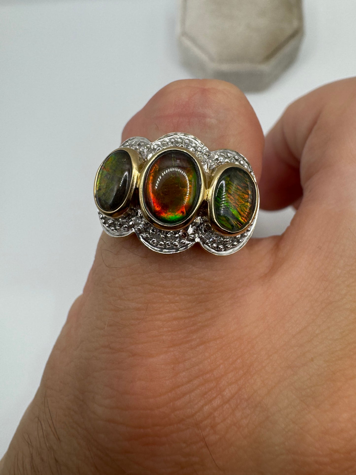 Heavy 9ct gold ammolite and diamond ring