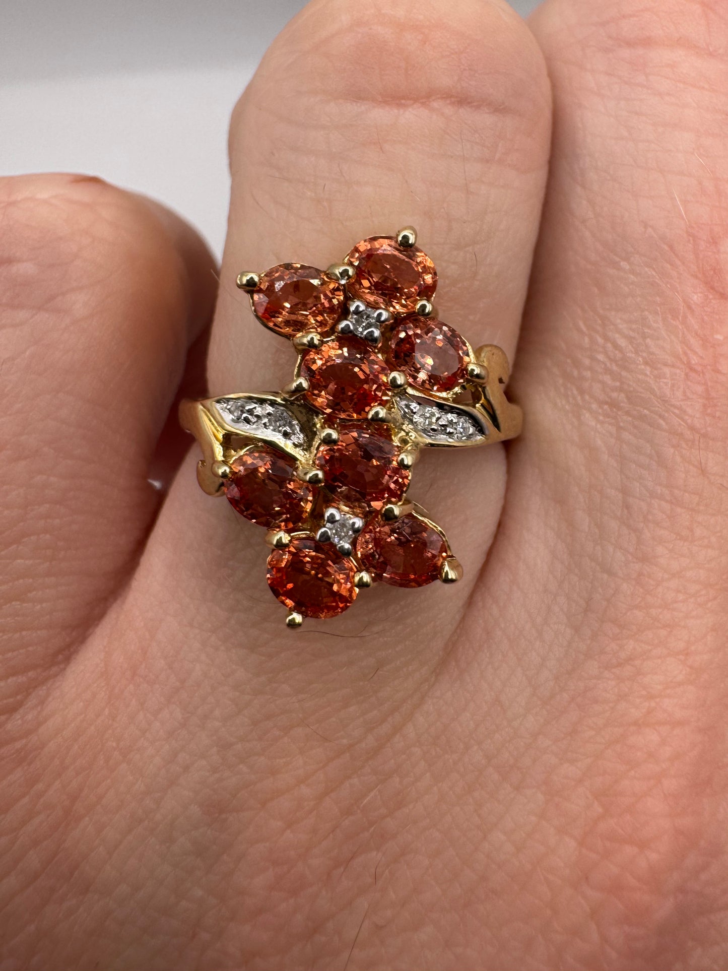 Heavy 9ct gold orange sapphire and diamond ring