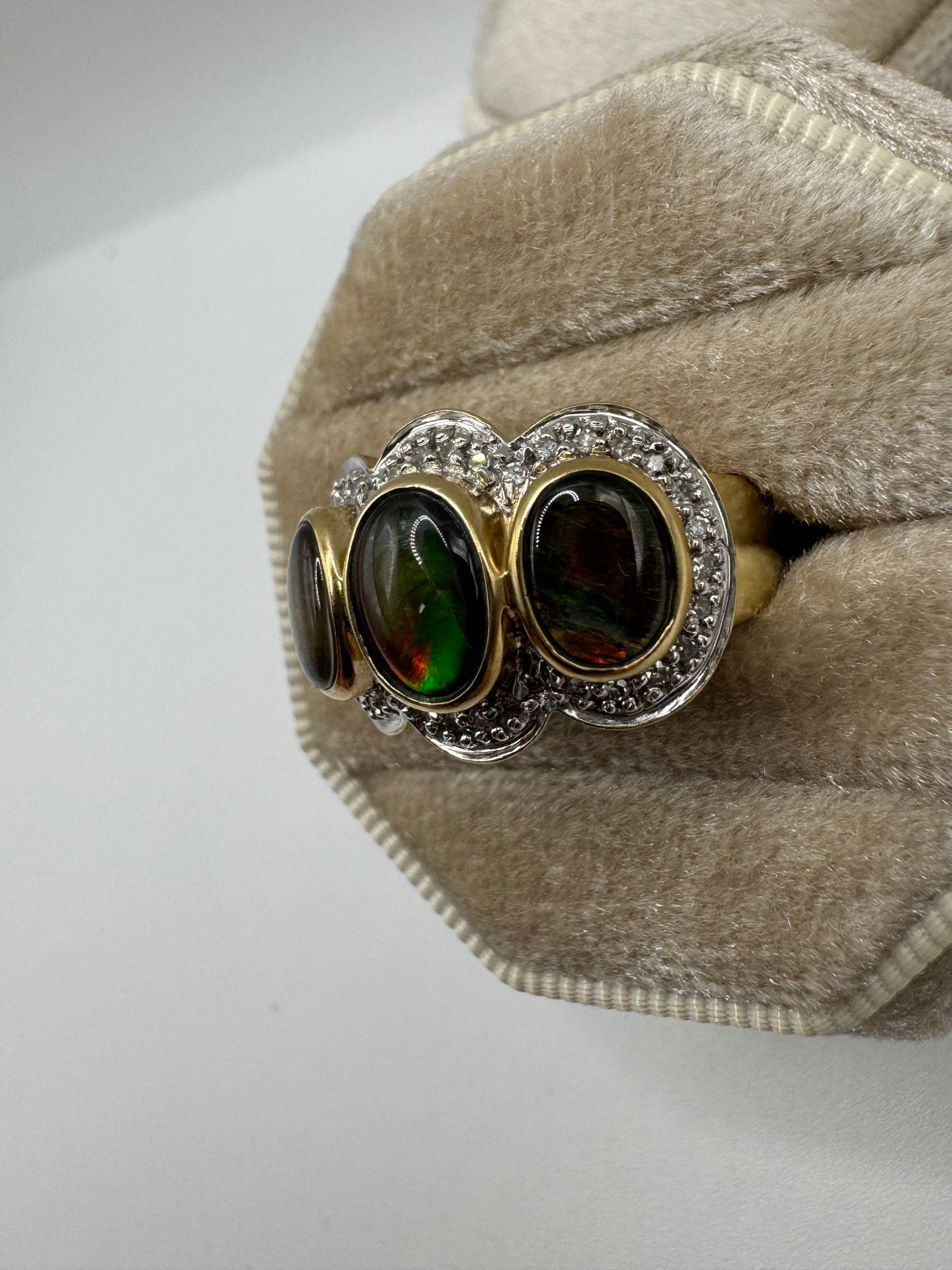 Heavy 9ct gold ammolite and diamond ring