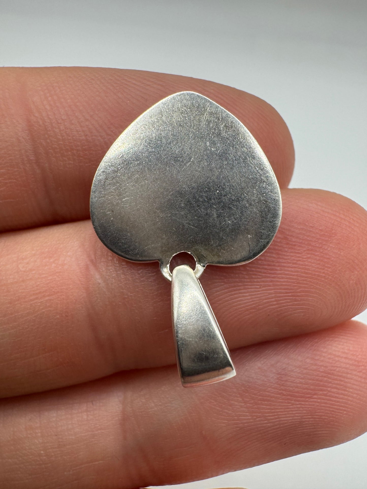 Silver mother of pearl and abalone heart pendant