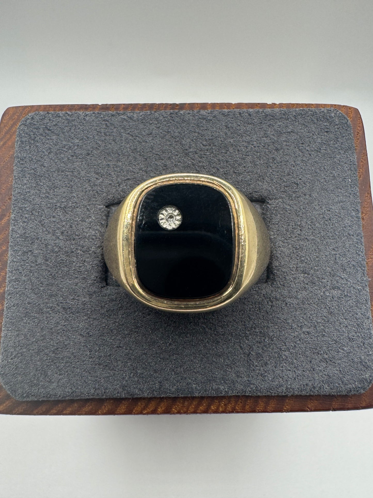 Heavy 9ct gold onyx and diamond ring