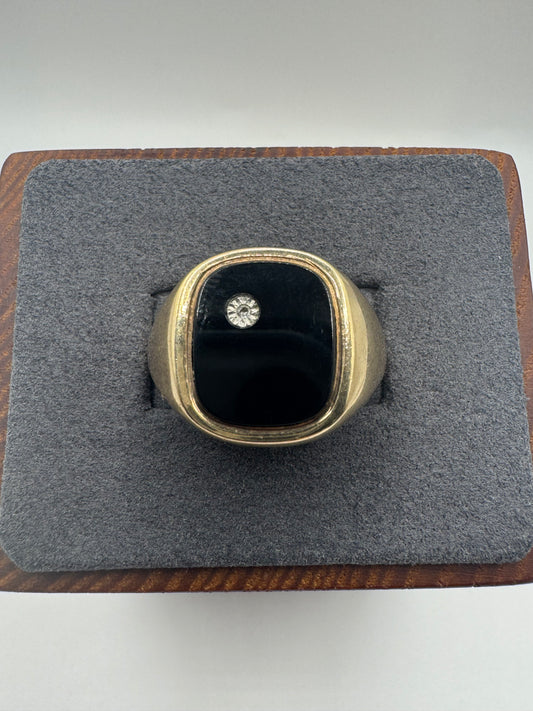 Heavy 9ct gold onyx and diamond ring