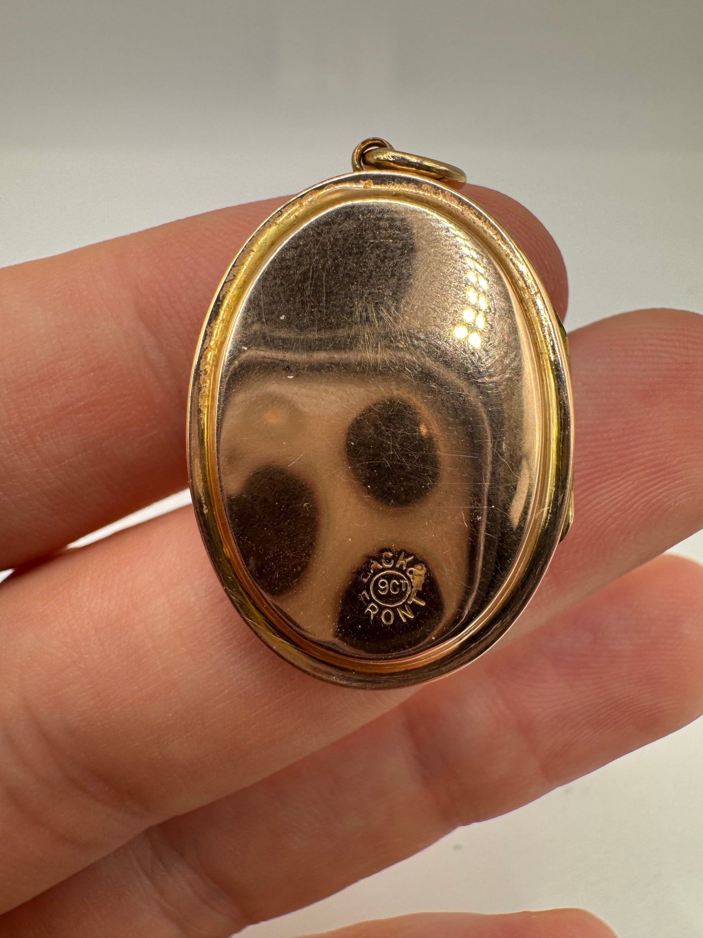 Edwardian 9ct gold front and back paste locket