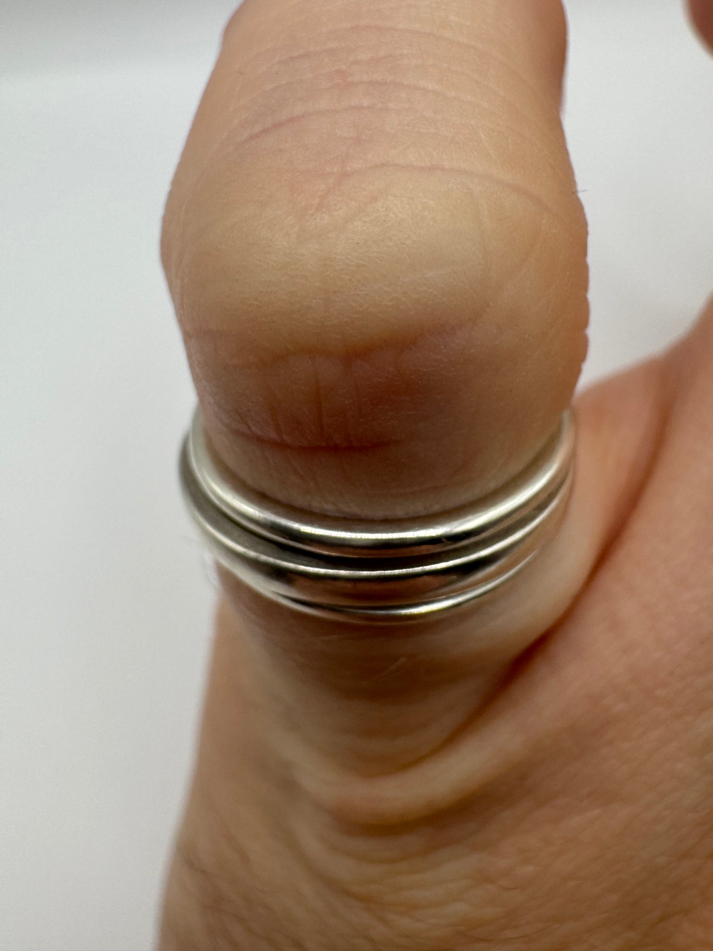 Silver spinning band