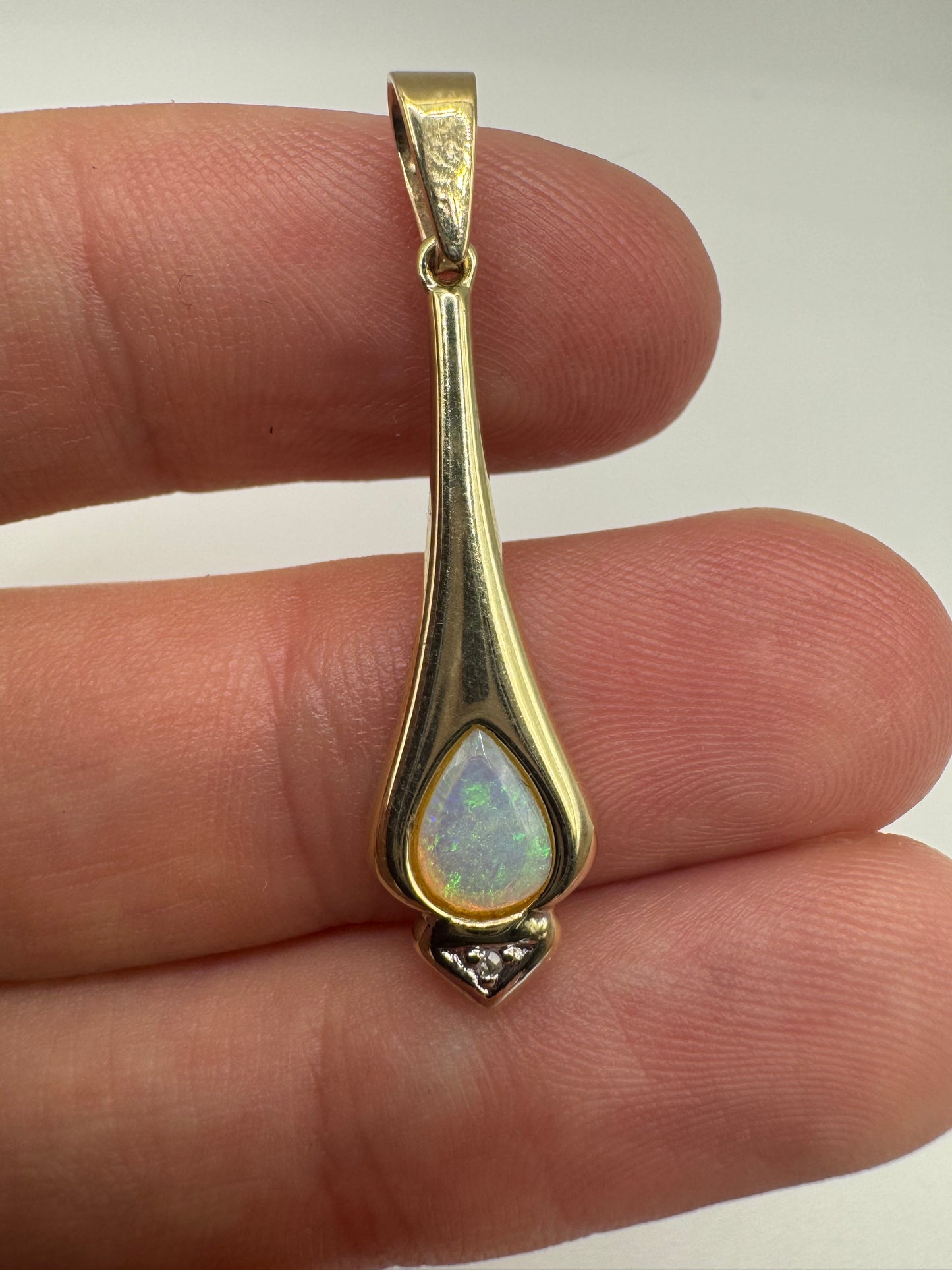 9ct gold opal and diamond pendant