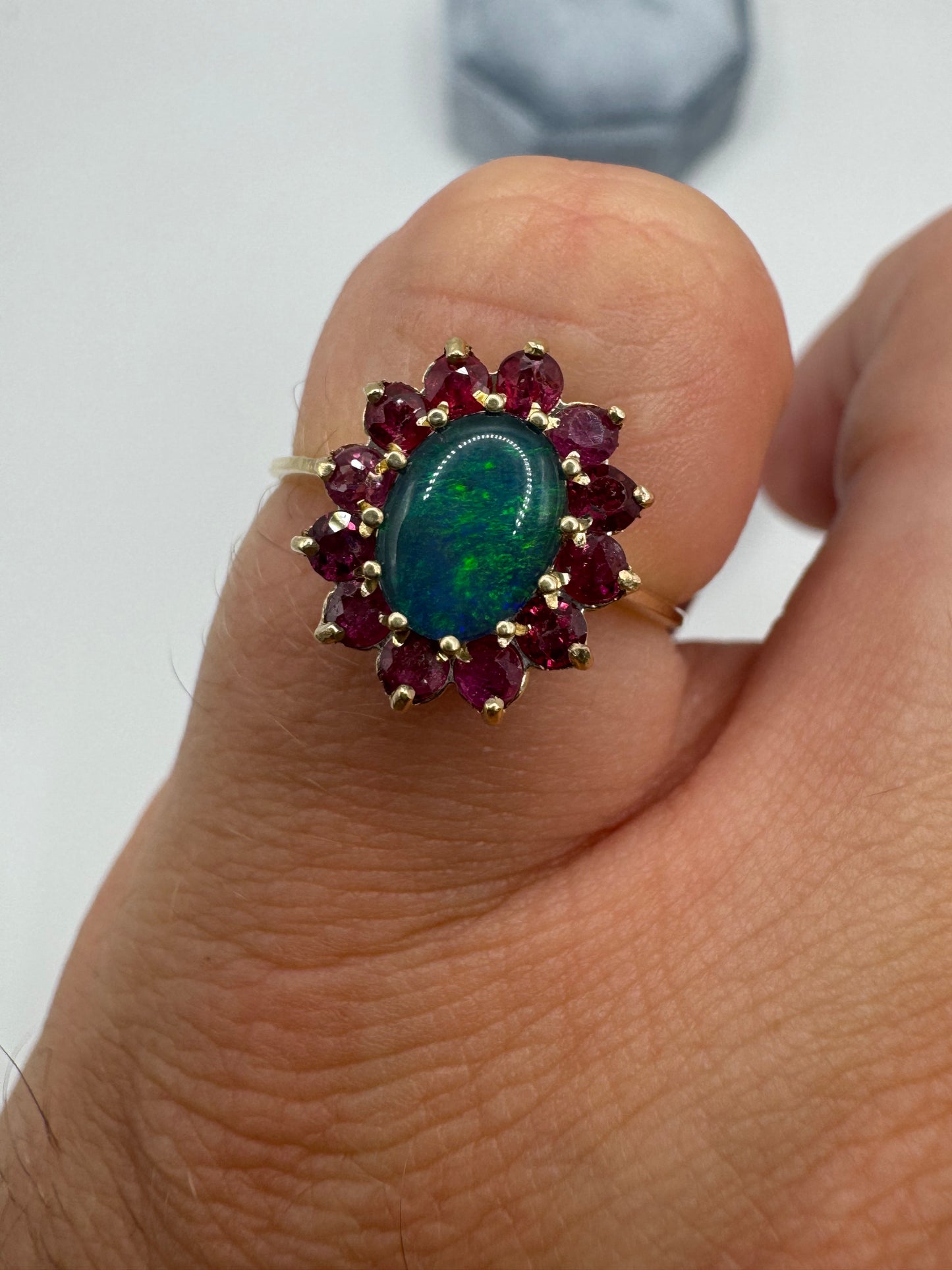 9ct gold black opal triplet and ruby cluster ring