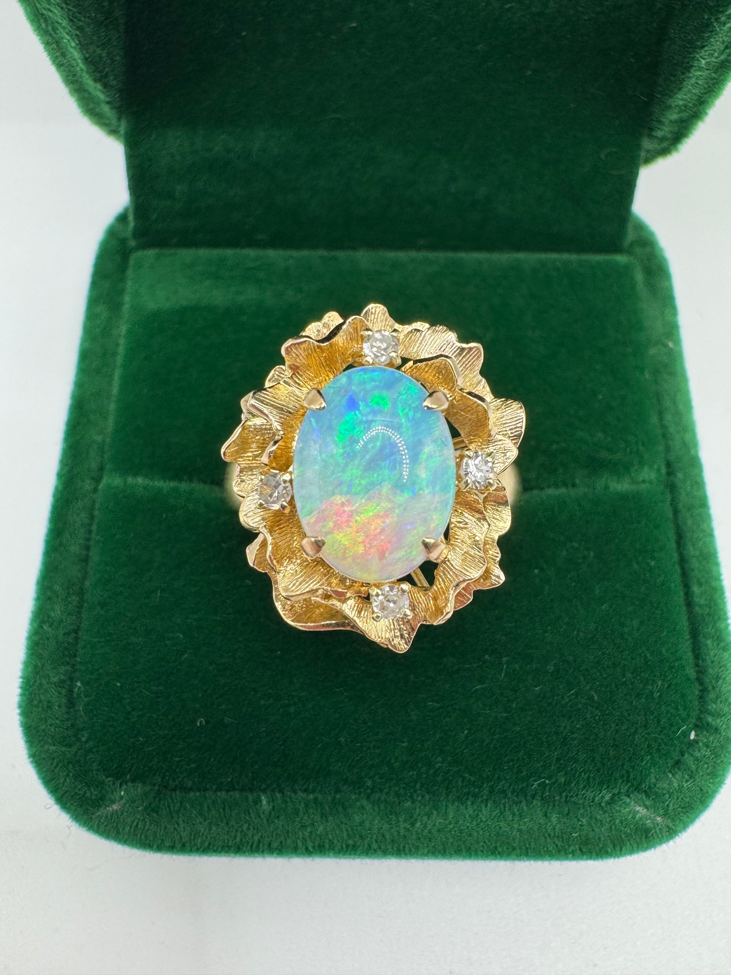 Heavy 9ct gold opal and diamond flower ring