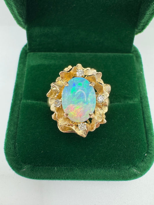 Heavy 9ct gold opal and diamond flower ring