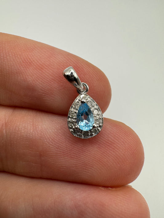 9ct white gold topaz and diamond pendant