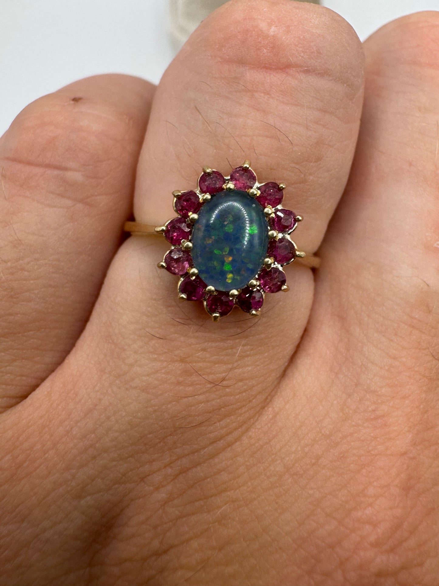 9ct gold black opal triplet and ruby cluster ring