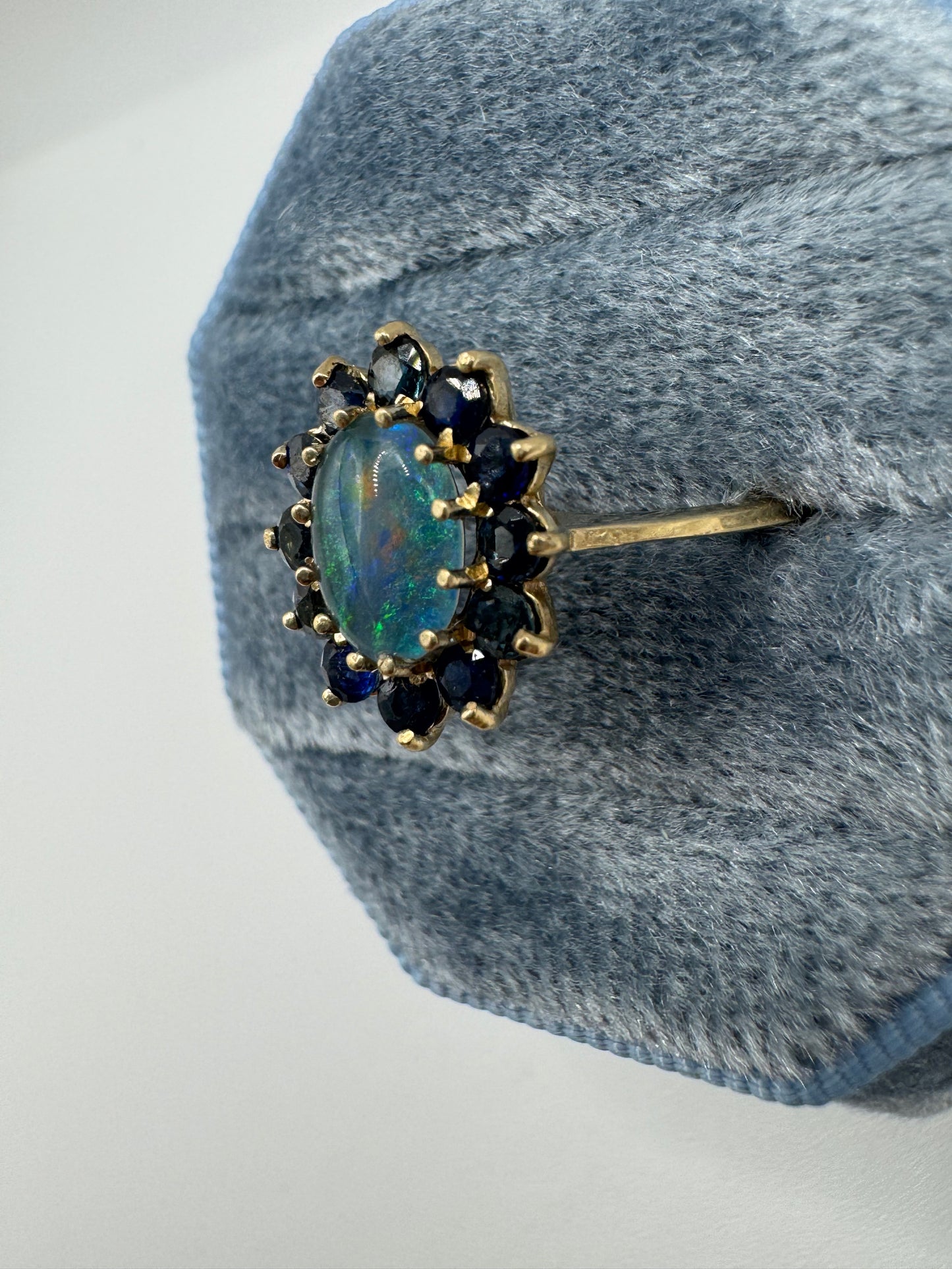 9ct gold black opal triplet and sapphire cluster ring