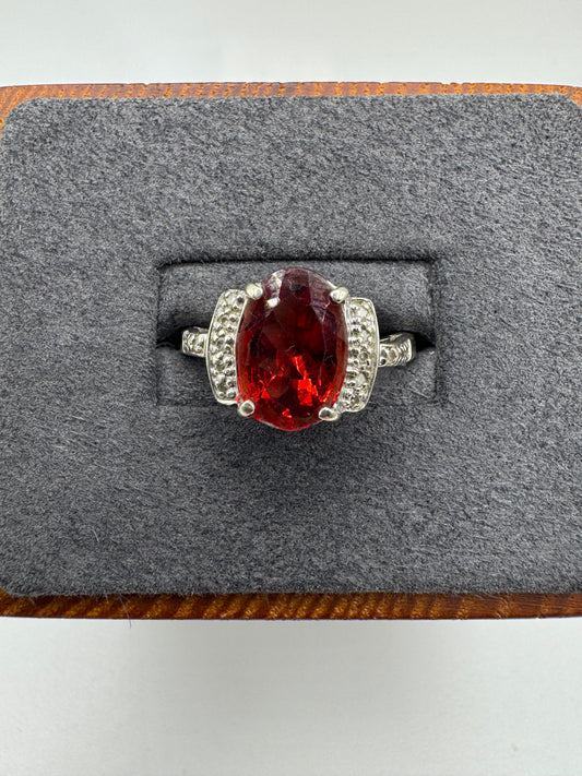 9ct white gold garnet and diamond ring