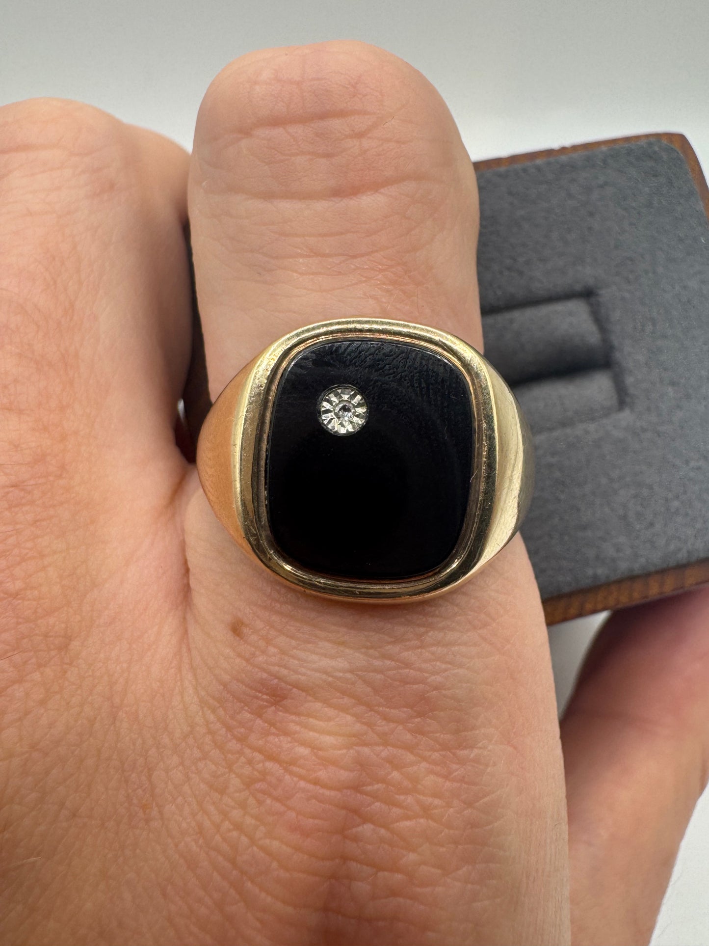 Heavy 9ct gold onyx and diamond ring