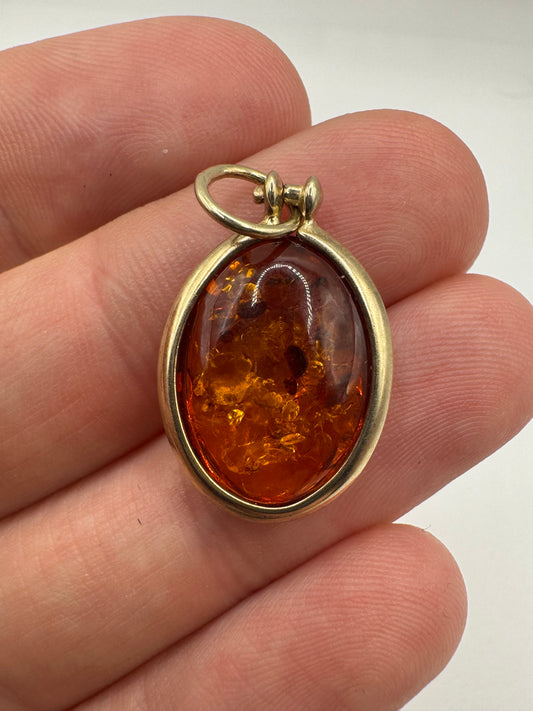 Silver amber pendant