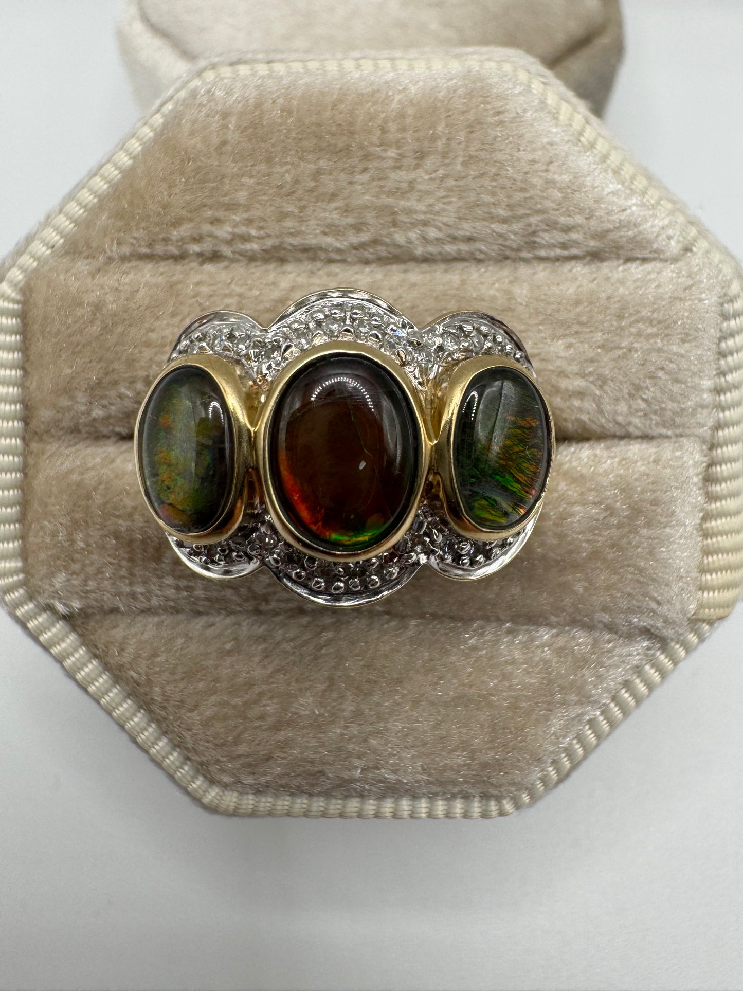 Heavy 9ct gold ammolite and diamond ring
