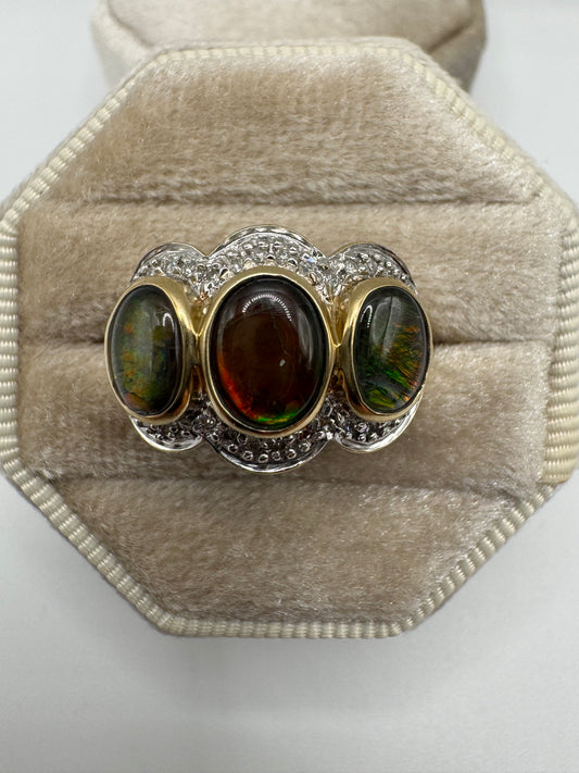 Heavy 9ct gold ammolite and diamond ring