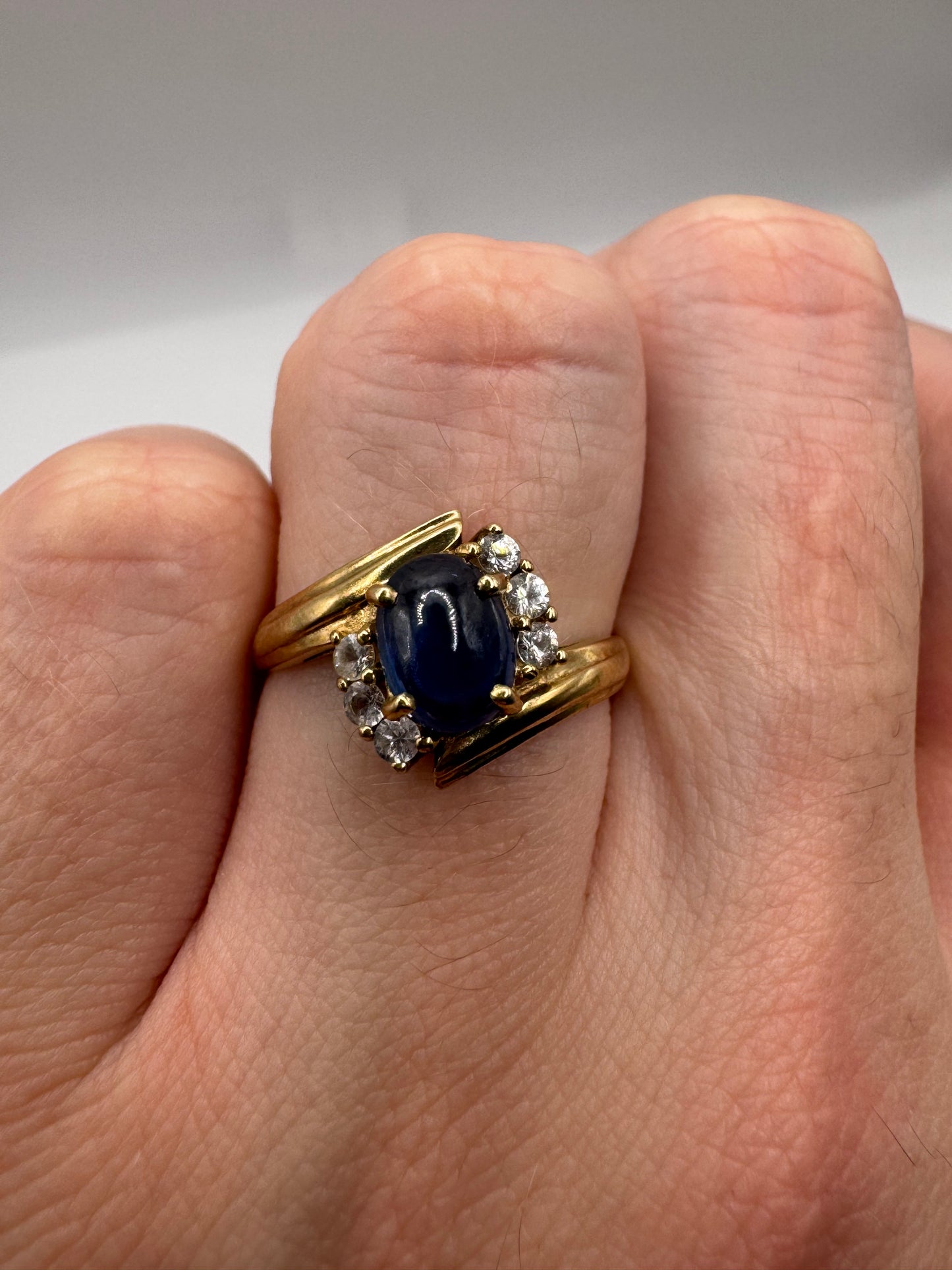 9ct gold cabochon sapphire and zircon ring