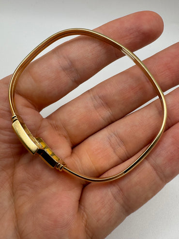Heavy 9ct gold topaz and amethyst bangle (7.5”)