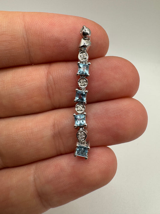 9ct white gold blue topaz and diamond pendant
