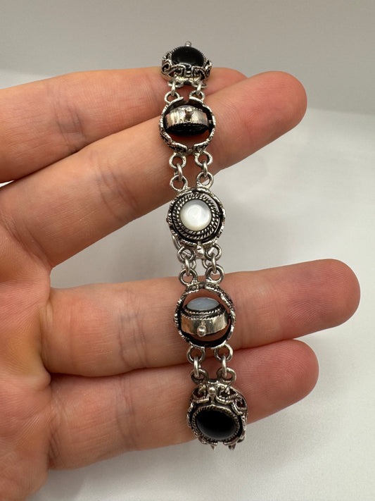 Silver moonstone and onyx reversible bracelet