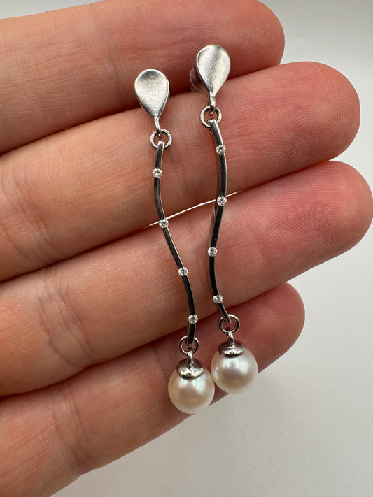 Heavy 9ct white gold pearl and diamond earrings