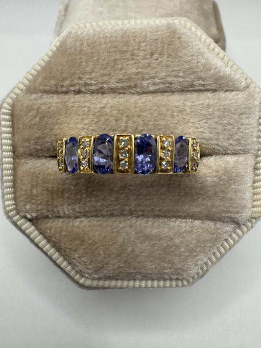 Heavy 9ct gold tanzanite and diamond ring