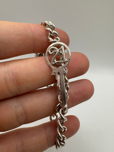 Silver padlock and charm bracelet