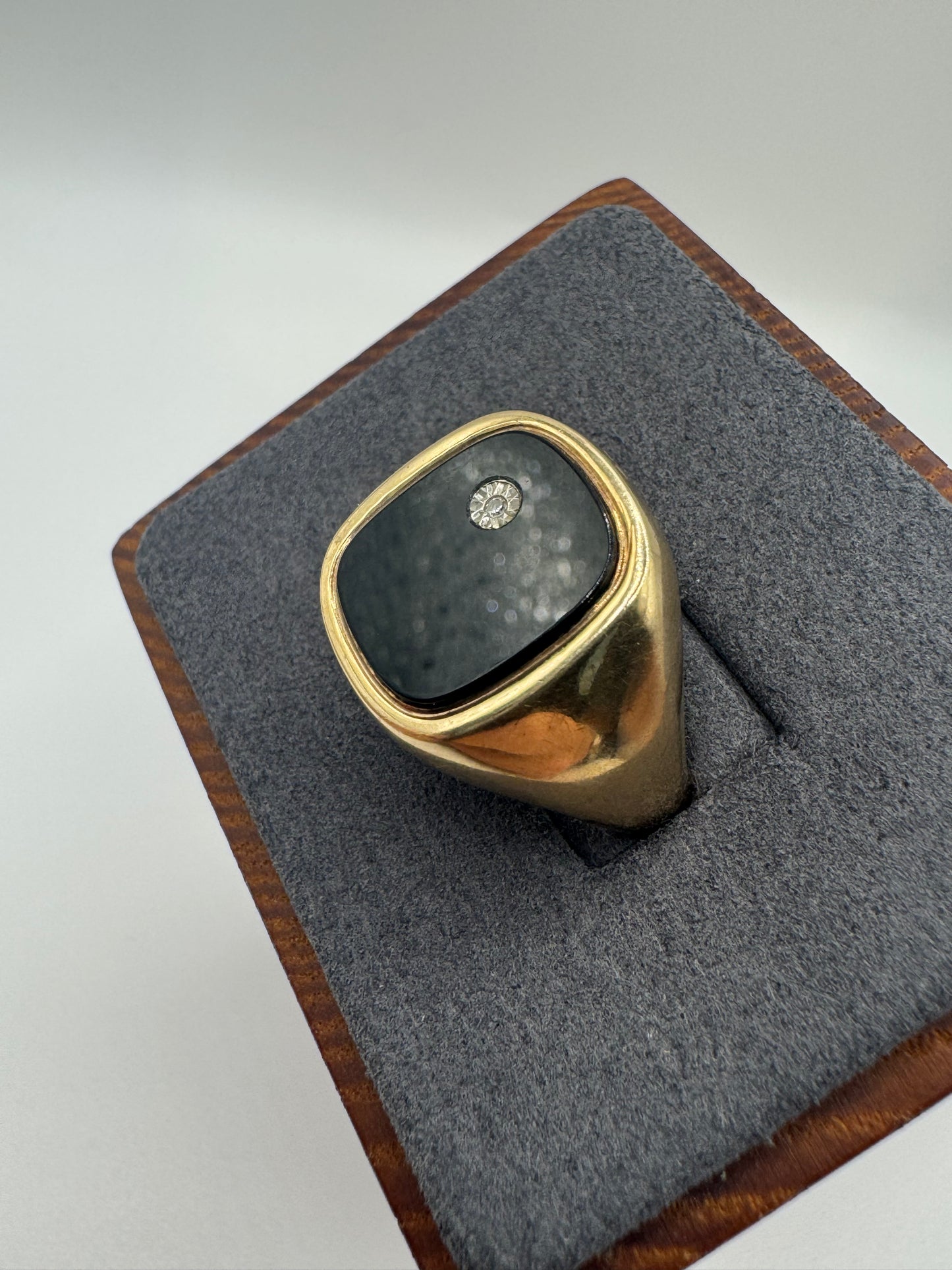 Heavy 9ct gold onyx and diamond ring