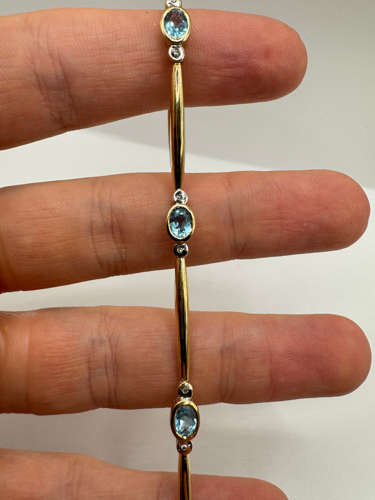9ct gold blue topaz and diamond bracelet