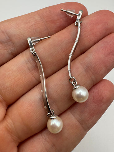 Heavy 9ct white gold pearl and diamond earrings