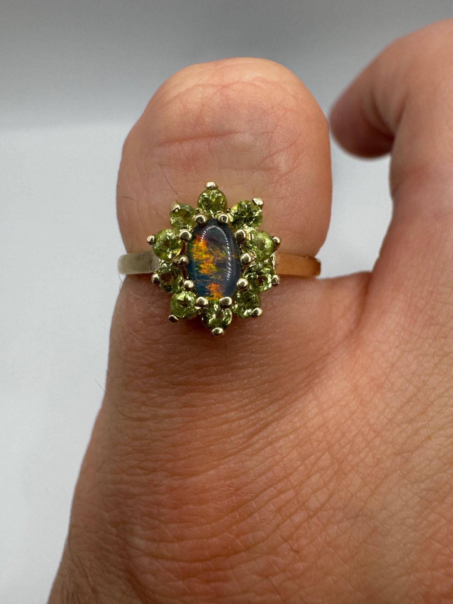 9ct gold black opal triplet and peridot ring