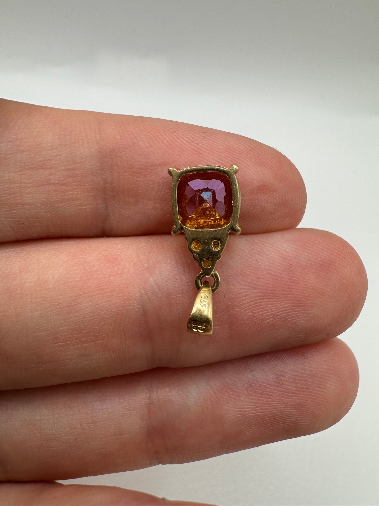 9ct gold topaz and diamond pendant